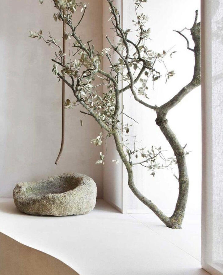 Sustainable architecture in Pantelleria with volcanic rock and organic interior design